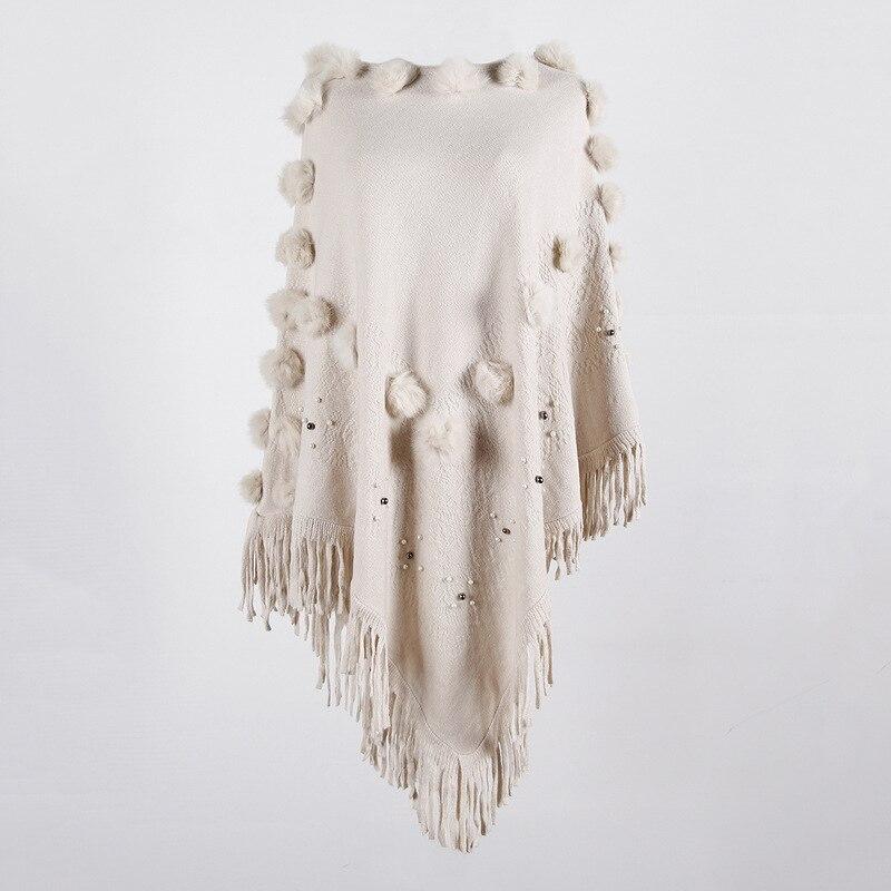 mode actuelle poncho avec pompon