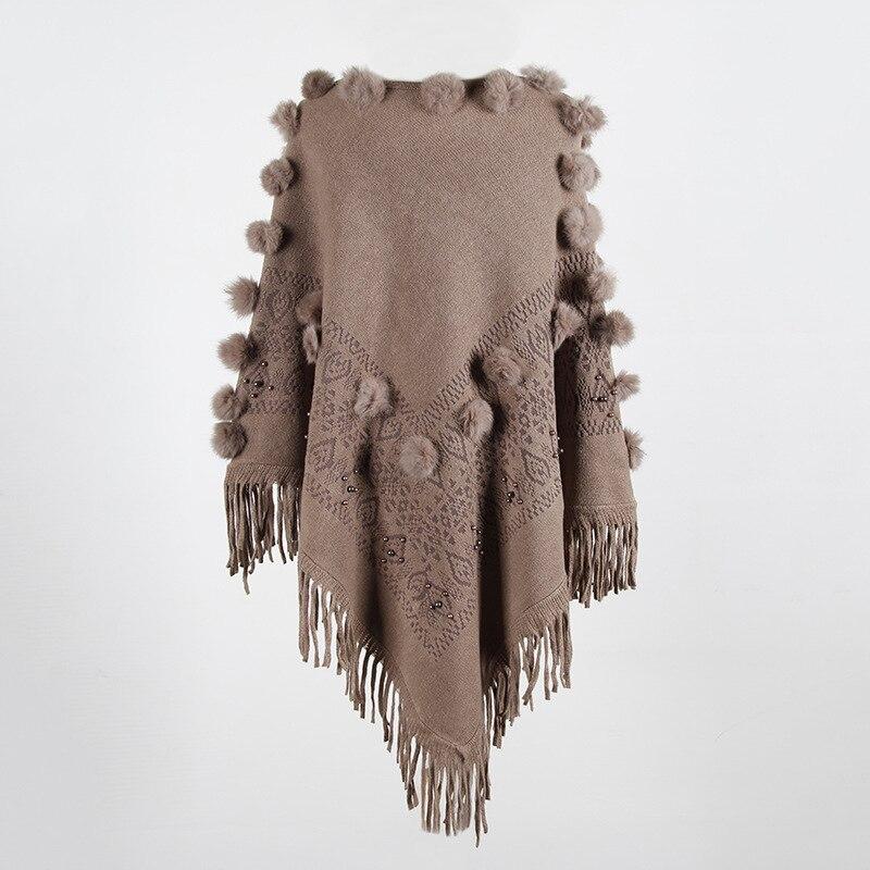poncho confortable avec pompon
