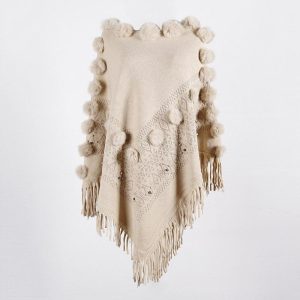 poncho avec pompon
