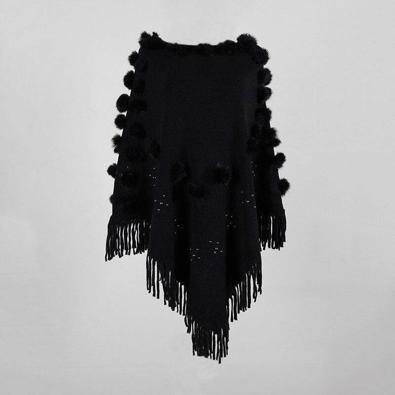 poncho multicolore avec pompon