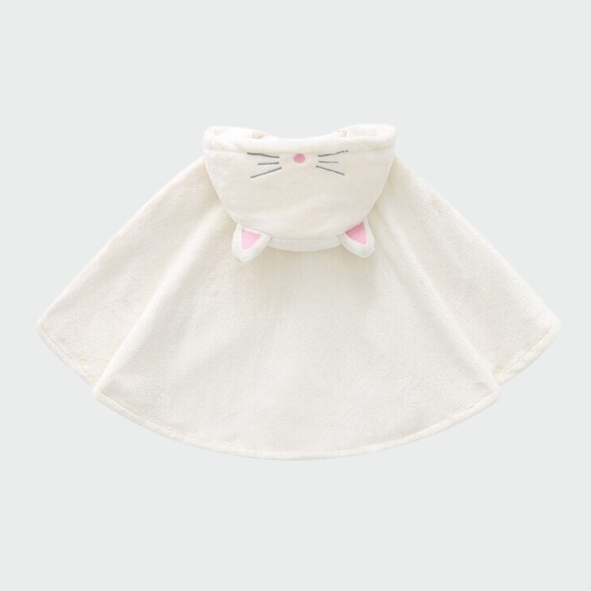 détails poncho chat