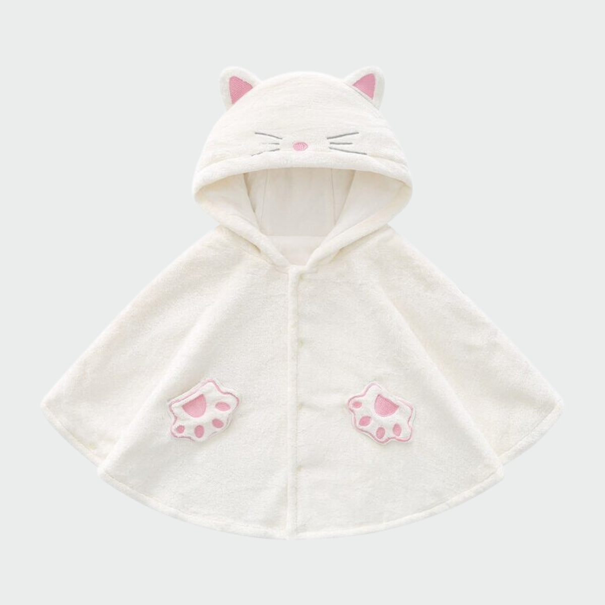 enfant portant poncho chat